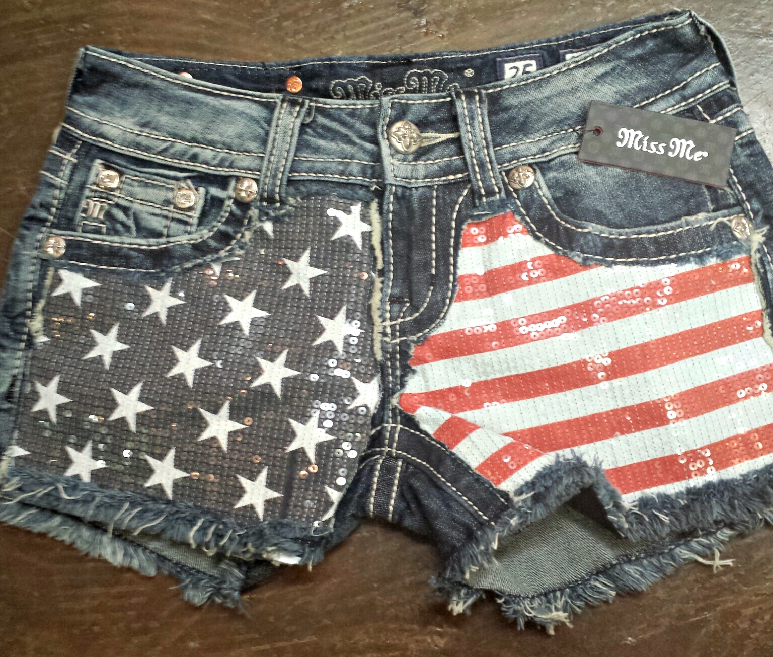 Miss Me shorts are the perfect staple for summer, and with a sequined flag pattern you can't go wrong.    Click the photo for details.