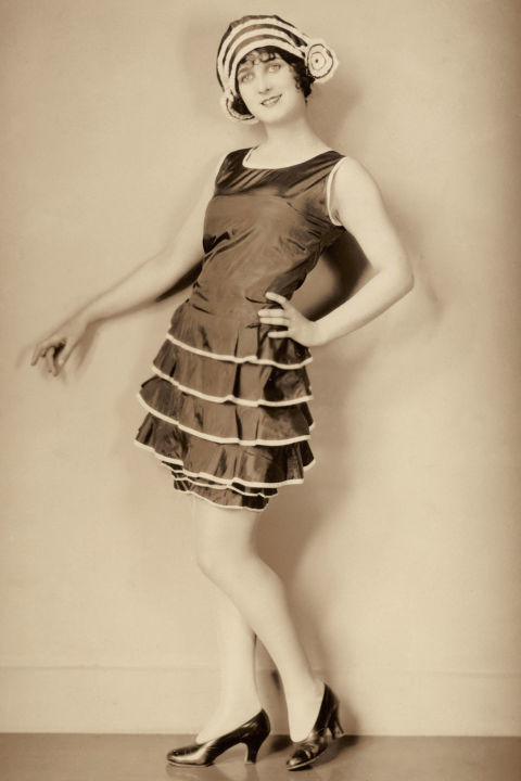 1920's -- Bathing Suit Dresses. Props to all the women who managed to stay afloat whilst swimming in these taffeta dresses.